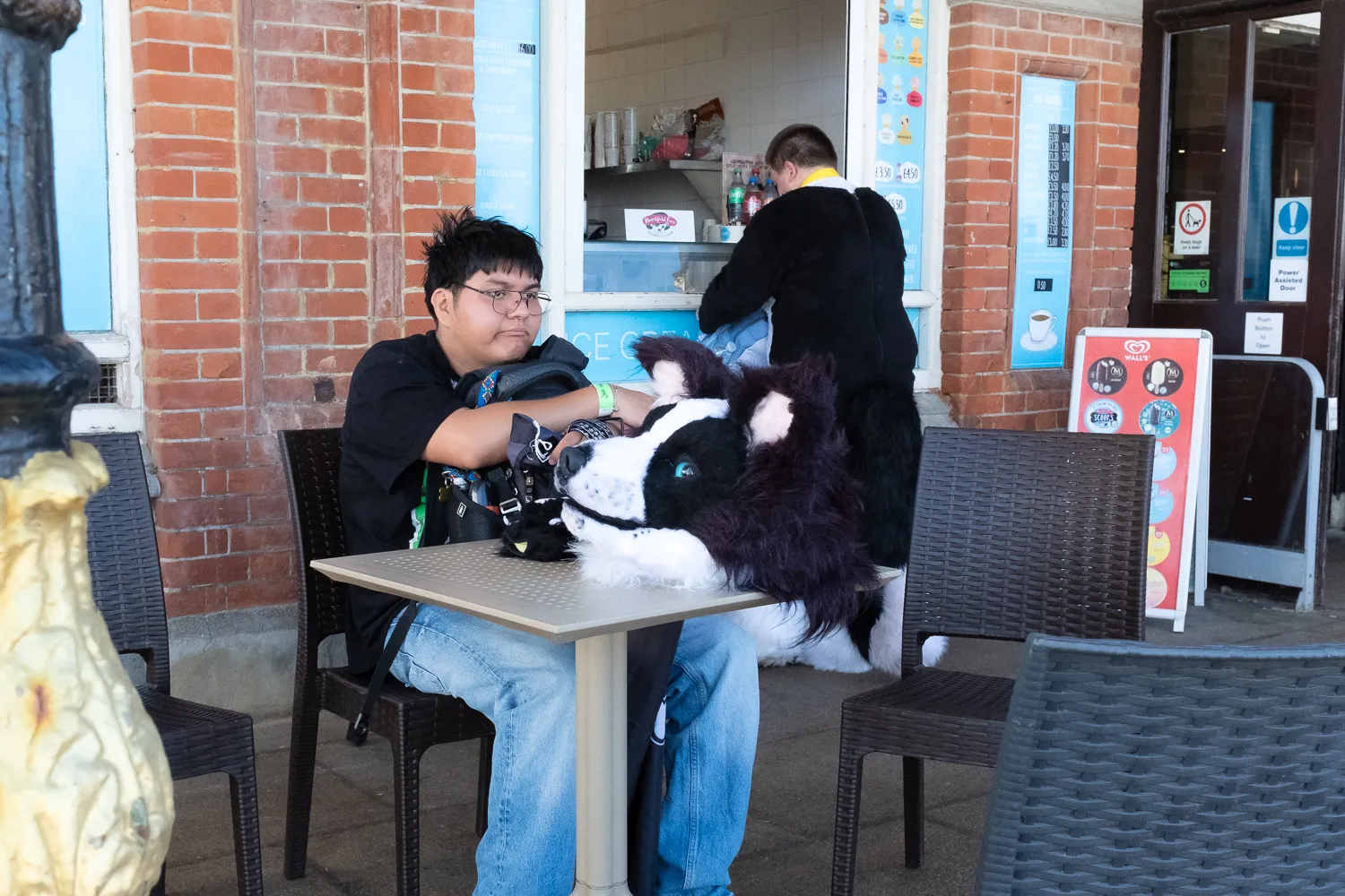 Furries on a break ordering ice cream