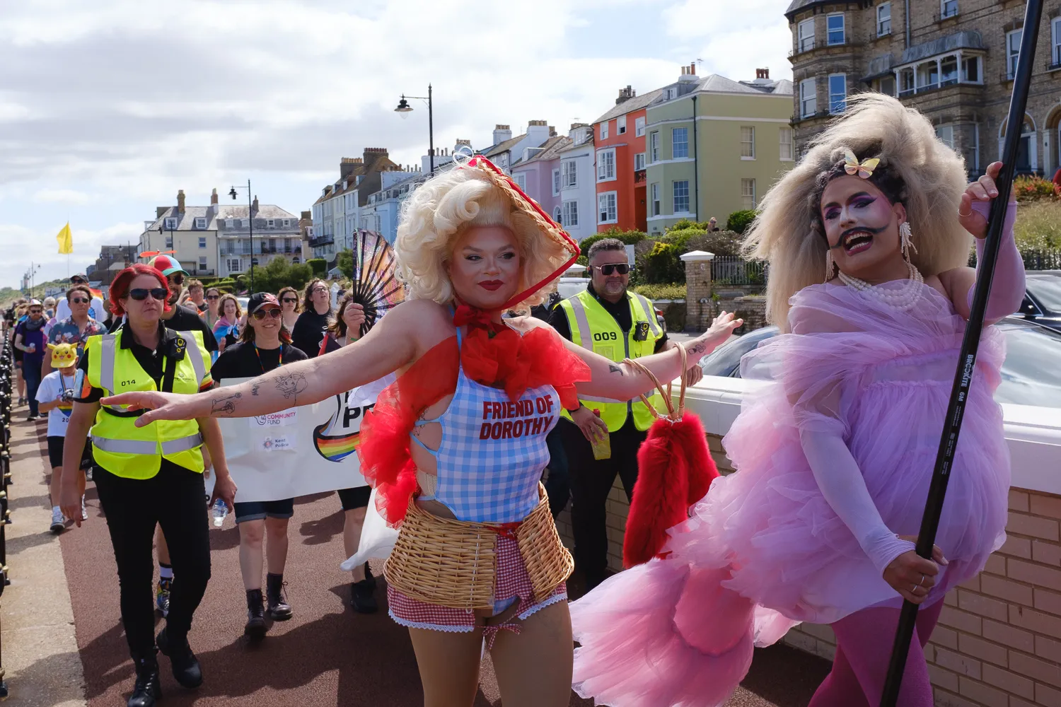 Two drag queens leading a Pride parade in Herne Bay